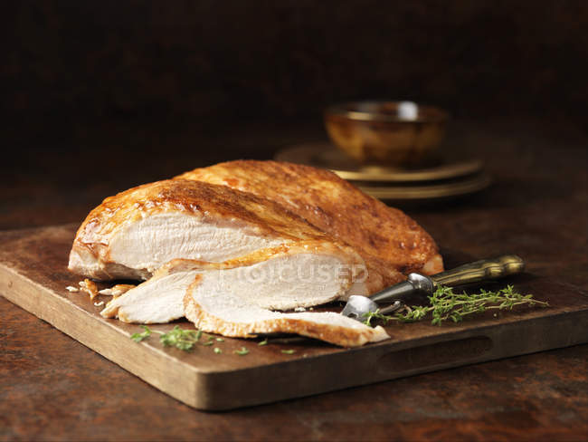Free range butter basted turkey breast with thyme — Stock Photo