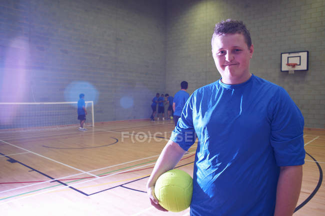 Soccer player indoors in sport facility, portrait — Stock Photo
