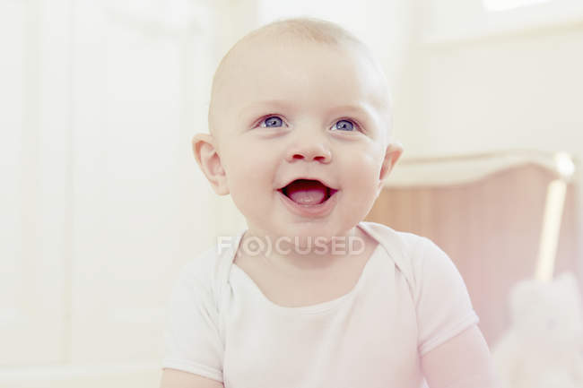 Portrait of smiling baby boy at home — Stock Photo