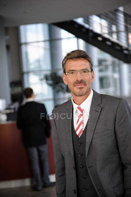 Businessman waiting in reception area — Stock Photo