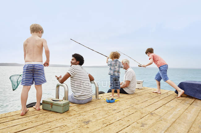 Family fishing on houseboat deck, Kraalbaai, South Africa — Stock Photo
