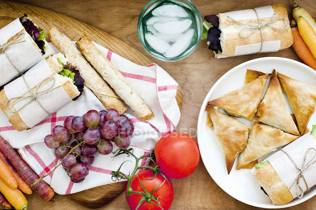 Ciabatta with puffs and fruits — Stock Photo