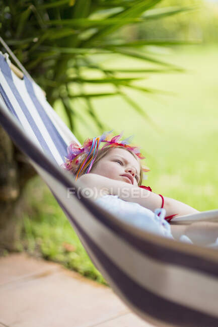 Girl lying in hammock — Stock Photo