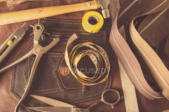 Still life of dressmaking equipment in leather jacket manufacturers, close-up — Stock Photo