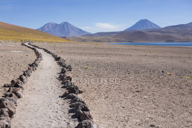 View of dirt track to national park San pedro de atacama — стоковое фото