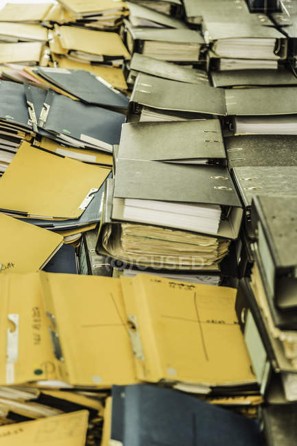 Close up of Pile of Rows of paper files — Stock Photo