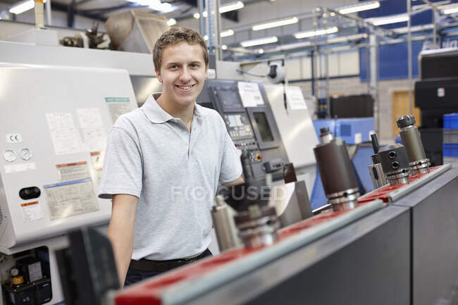 Portrait of worker in engineering factory — Stock Photo