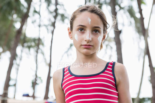 Portrait of young girl with suncream on her face, Krabi, Thailand, Southeast Asia — Stock Photo