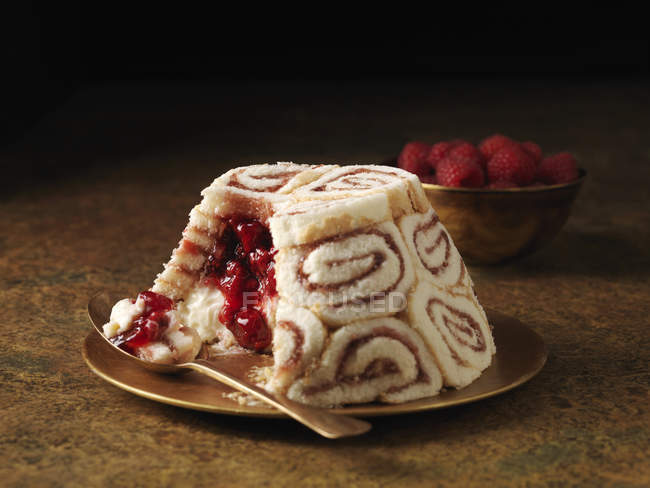 Swiss roll dessert with raspberries stuffing — Stock Photo