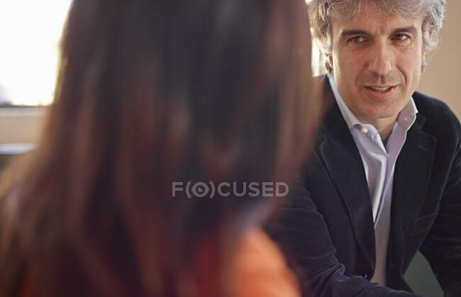 Mature businessman in meeting — Stock Photo