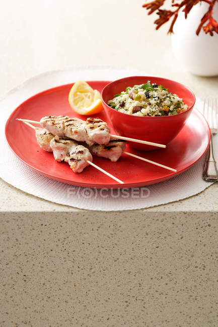 Plate of chicken with rice — Stock Photo