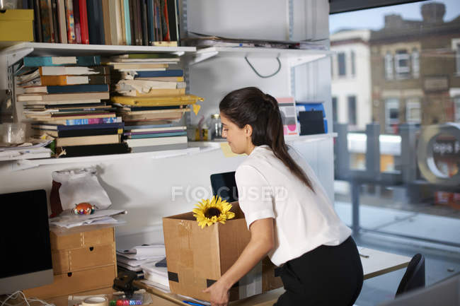 Woman moving from the office — Stock Photo