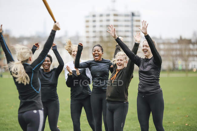 Female rounders team celebrating at rounders match — Stock Photo