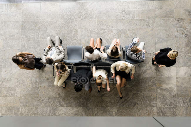 Business people playing musical chairs — Stock Photo