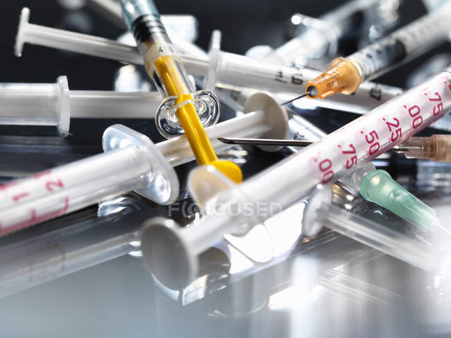 Closeup shot of variety of hypodermic syringes — Stock Photo