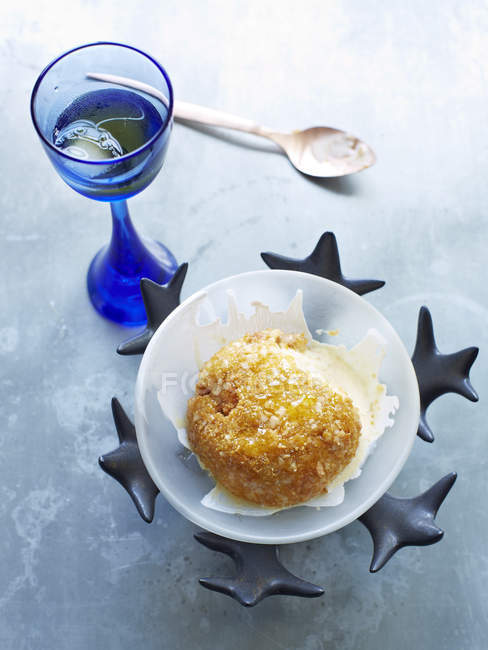 Still life with bowl of fried ice cream — Stock Photo