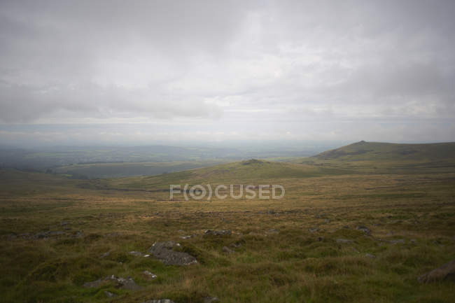 Scenic view of Dartmoor hillside at misty weather, Devon, UK — Stock Photo