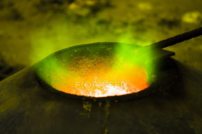 Green flamed furnace in bronze foundry — Stock Photo