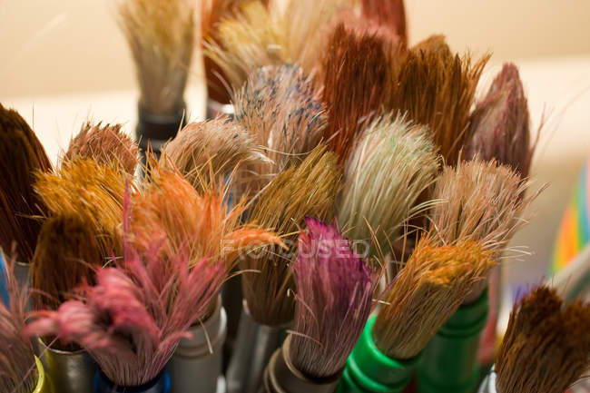 Old colored Paint brushes — Stock Photo