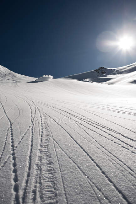 Tracks in white snow — Stock Photo