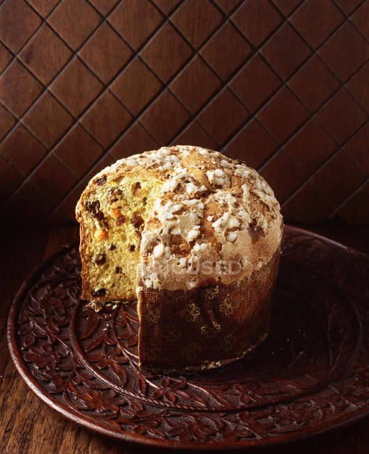 High angle view of Italian panettone on wooden board — Stock Photo