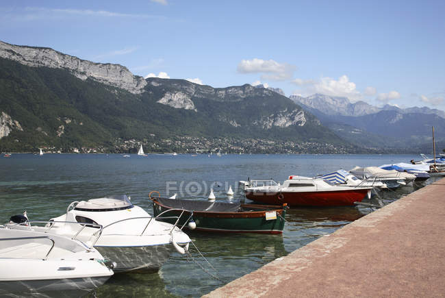 Boats moored at pier — Stock Photo