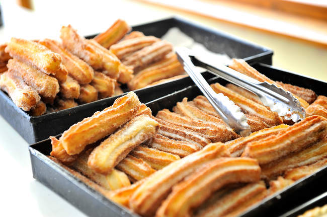 Fresh fried churros — Stock Photo