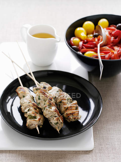 Chicken kebabs with vegetables — Stock Photo