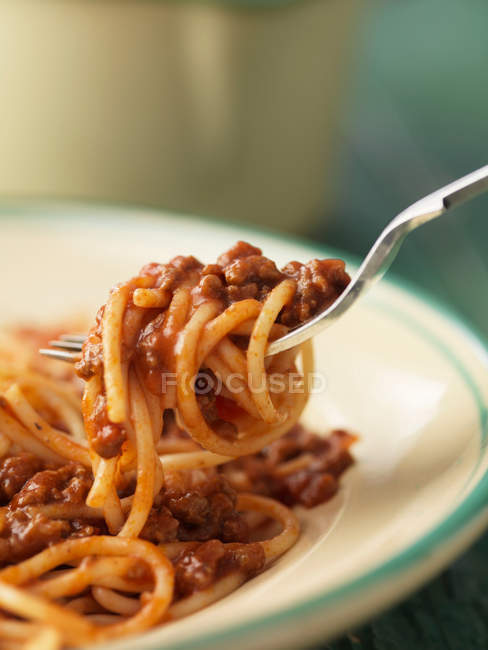 Forkful of spaghetti bolognese — Stock Photo