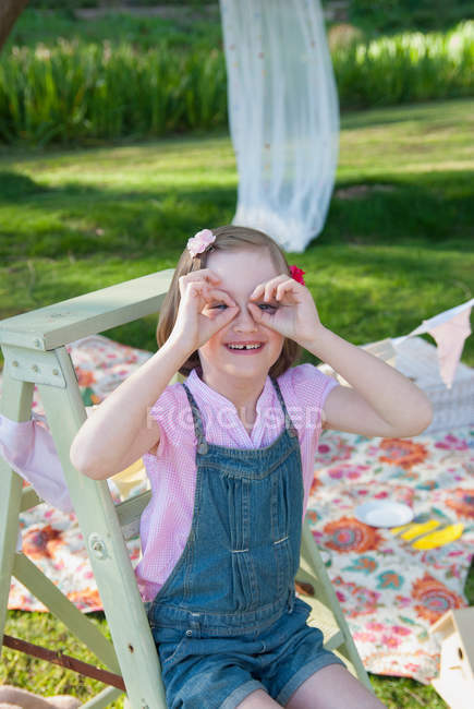 Girl making faces outdoors — Stock Photo