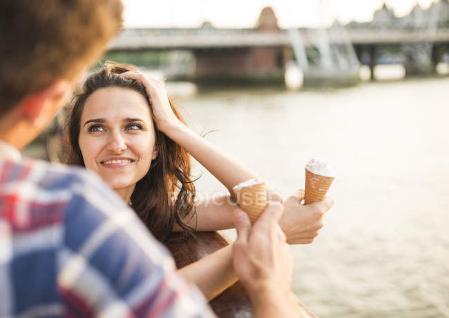 Young woman with ice cream cone — Stock Photo