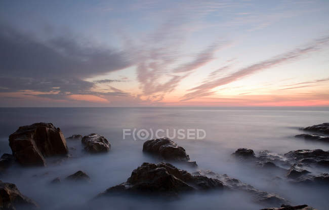 Vista del tramonto sulla costa — Foto stock