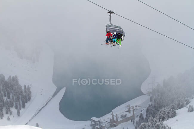Three people on ski lift in Kuhtai, Austria — Stock Photo