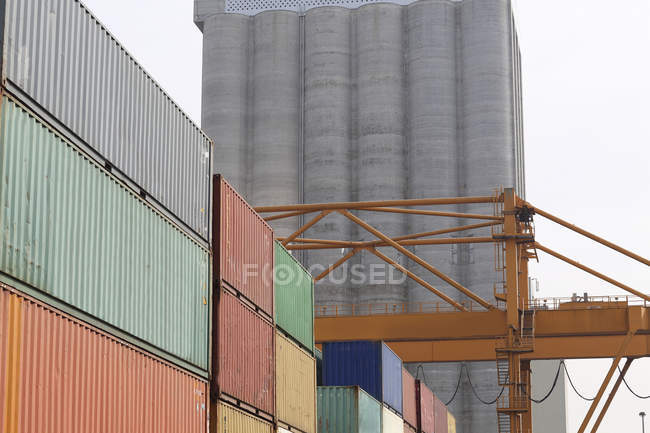 Stack of freight containers in port — Stock Photo