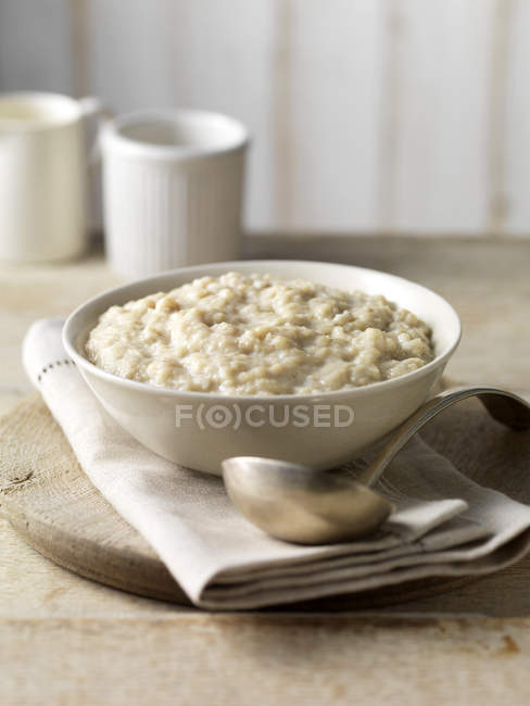 Classic bread sauce in bowl with ladle — Stock Photo