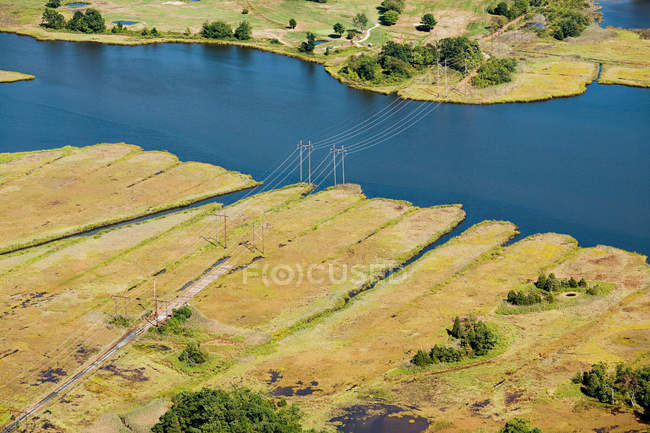 Power lines over water, Newport County, Rhode Island, USA — Stock Photo