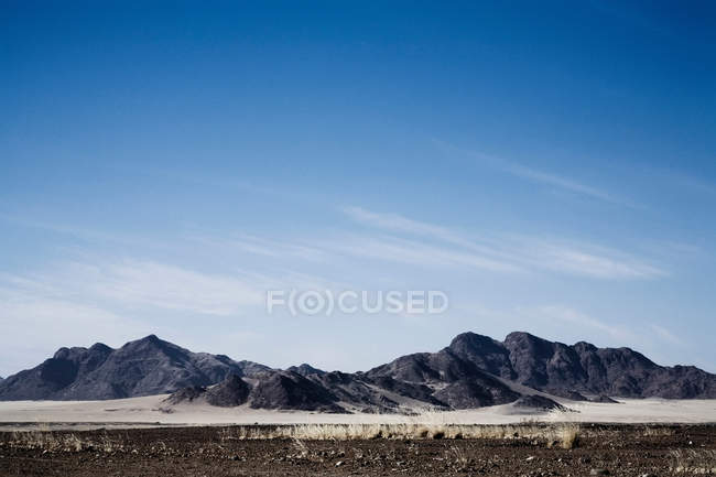 Mountains in dry landscape — Stock Photo