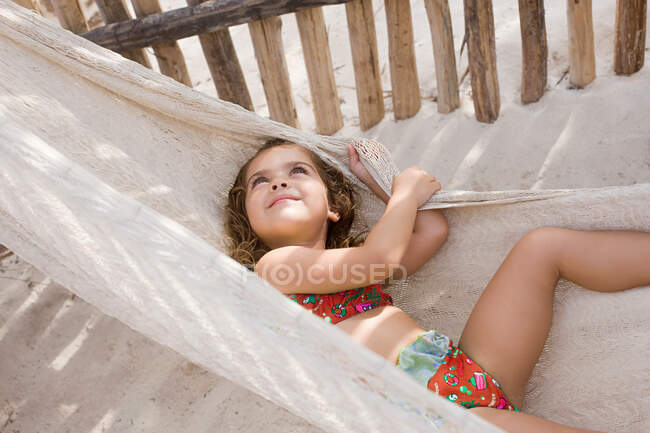 A girl on a hammock — Stock Photo