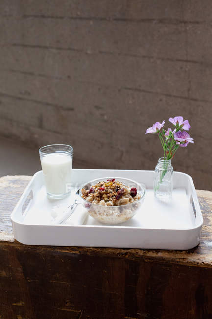 Breakfast tray with bowl of muesli — Stock Photo