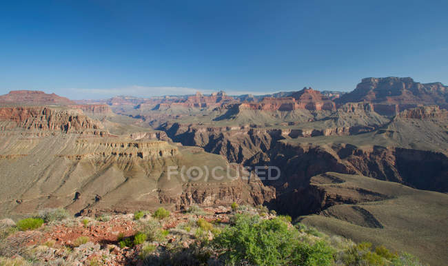 Vista panoramica del grande canyon alla luce del sole — Foto stock