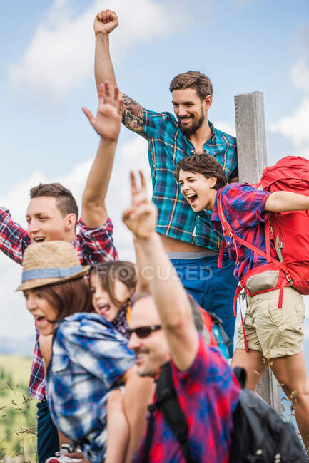Group of friends cheering — Stock Photo