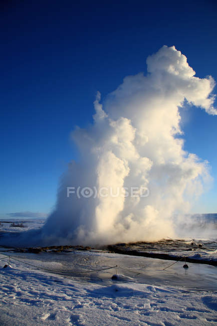 Steam rising from natural geyser — Stock Photo