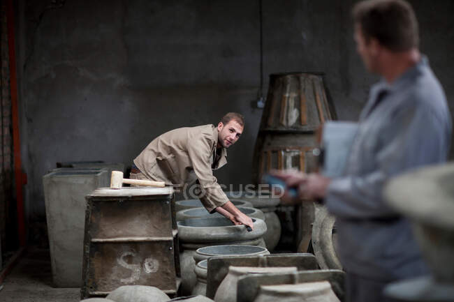 Fetching potters wheel at pottery factory — Stock Photo