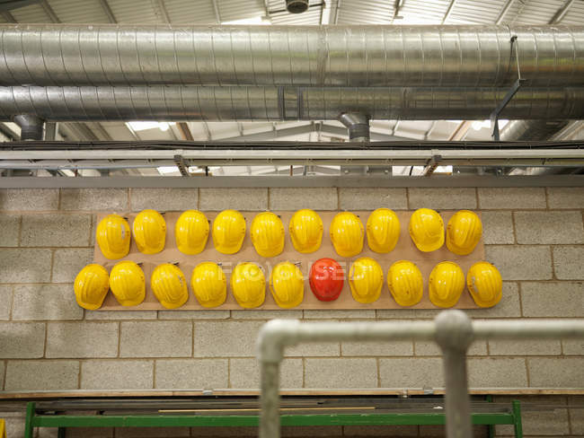 Yellow And Red Hard Hats — Stock Photo