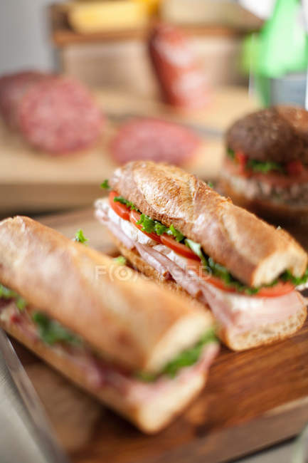 Sandwiches on cutting board — Stock Photo