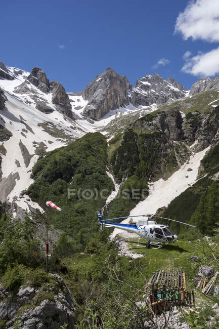 Helicopter on scenic flight, Alleghe, Dolomites, Italy — Stock Photo
