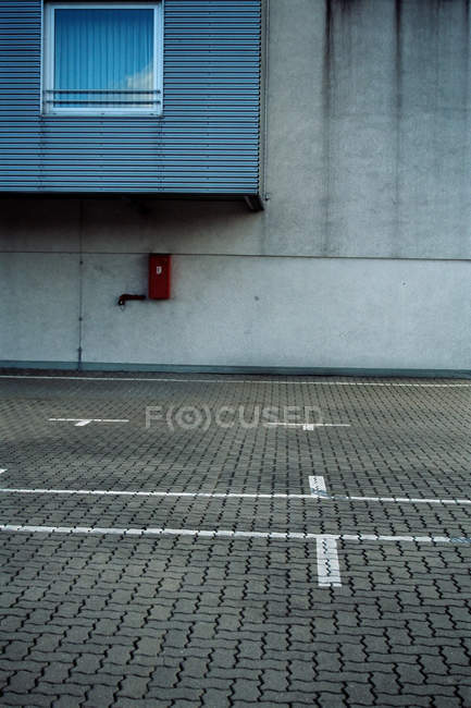 Empty parking lot on concrete floor — Stock Photo