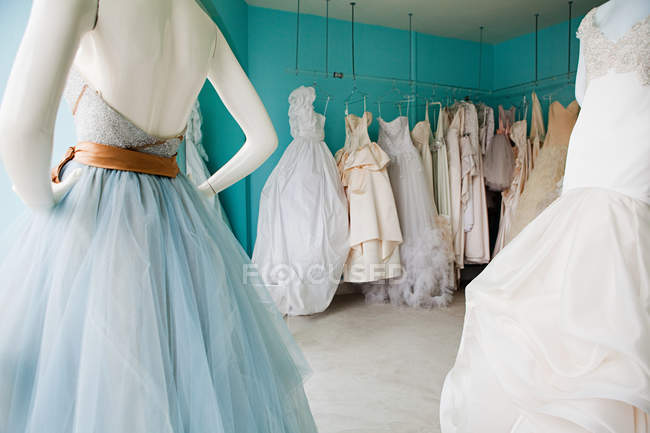 Wedding dresses in boutique — Stock Photo