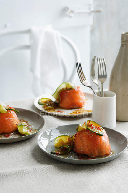 Plates of salmon timbales — Stock Photo