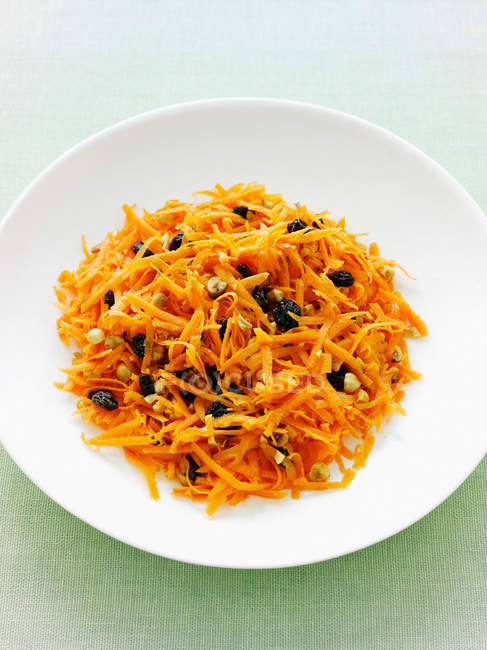 Bowl of grated carrot salad — Stock Photo